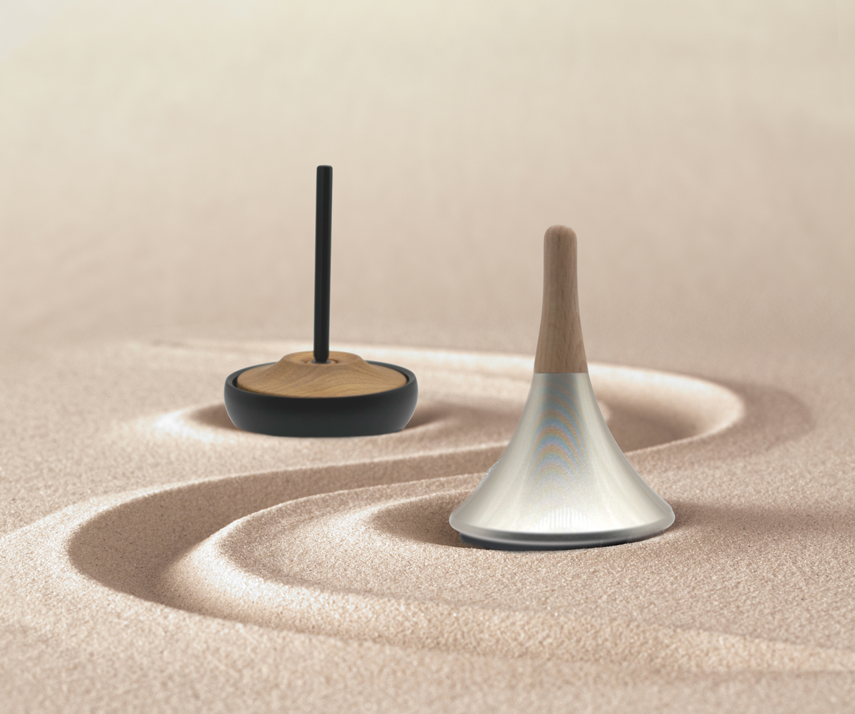 Two bellaura bells on a sandy surface 