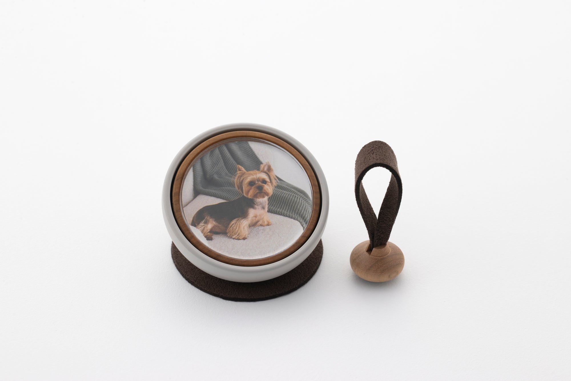 Tailo pet memorial bell in Chocolate with a dark brown mallet and mat
