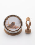 Tailo pet memorial bell in Tan color with a photo of a brown dog